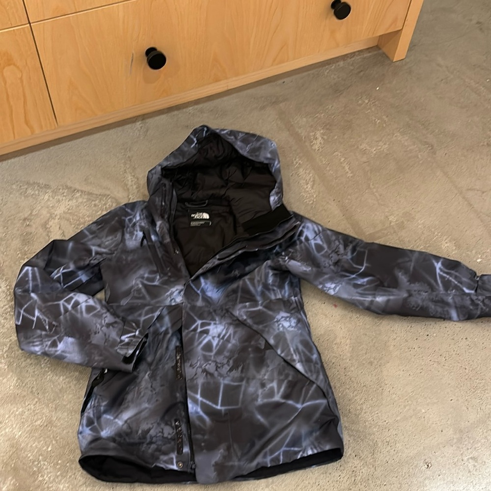 Like new lighting bolt blue and black ski coat by The North Face